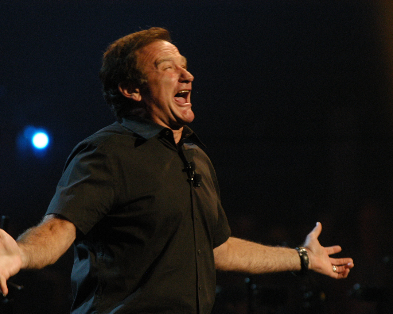 Робин Уильямс радуется