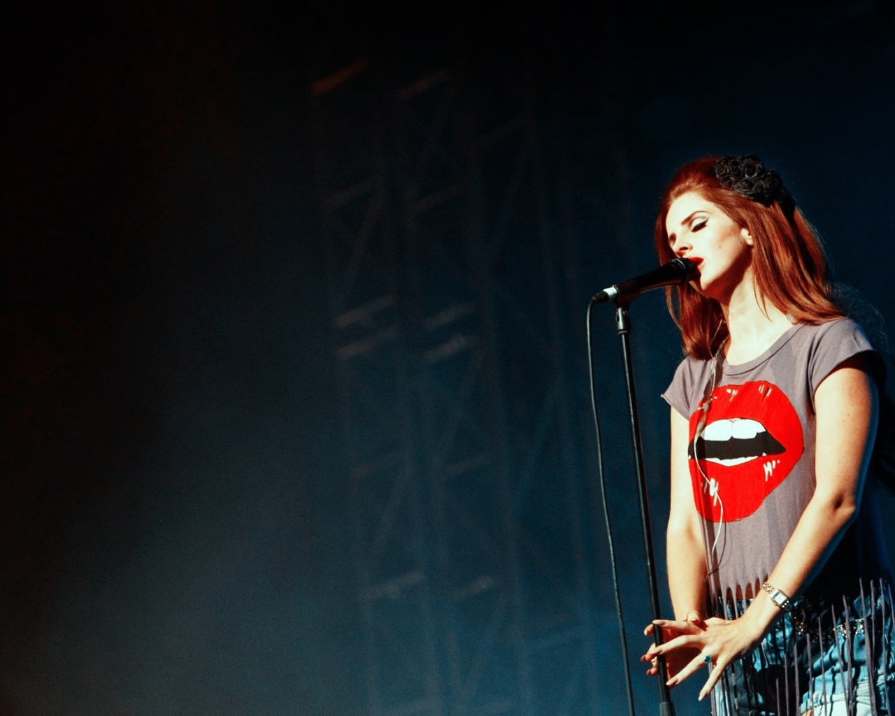 	   Lana Del Rey at the microphone