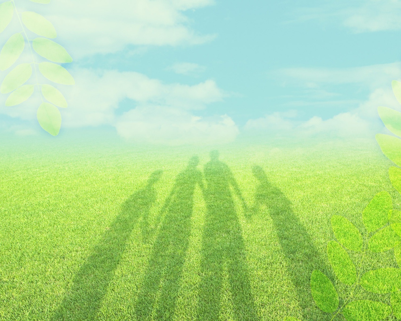 Тень семьи на траве