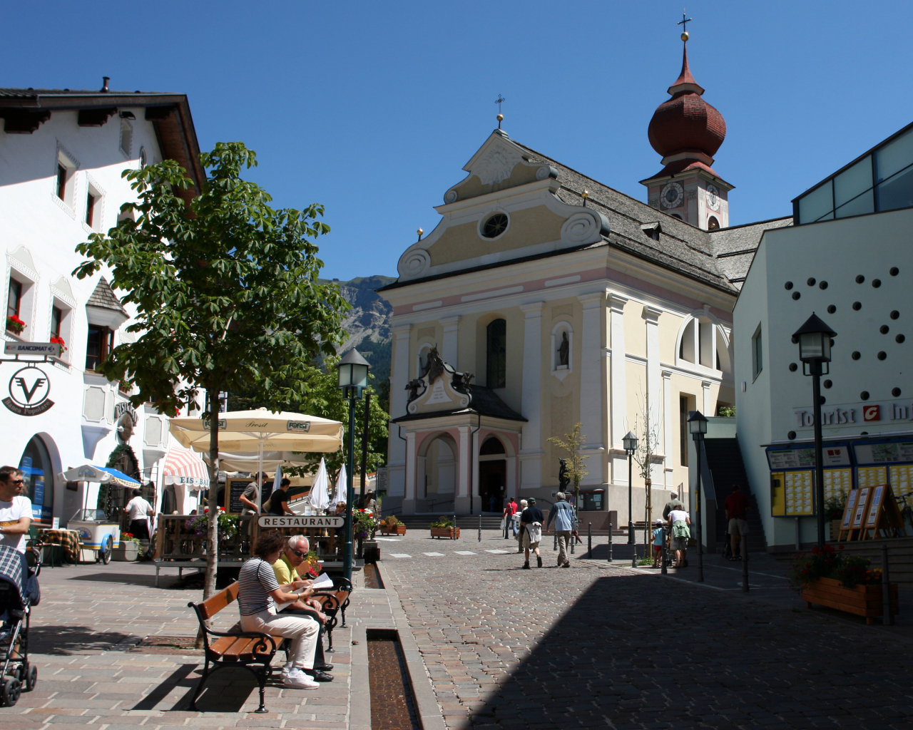 Church on the square in Ortisei, Italy