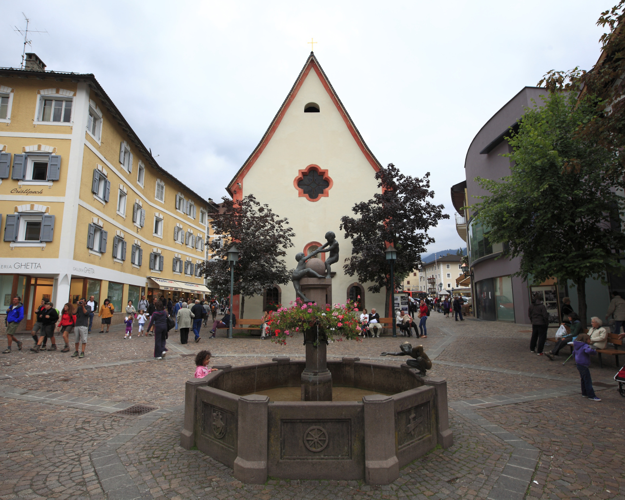 Fountain in the square in Ortisei, Italy