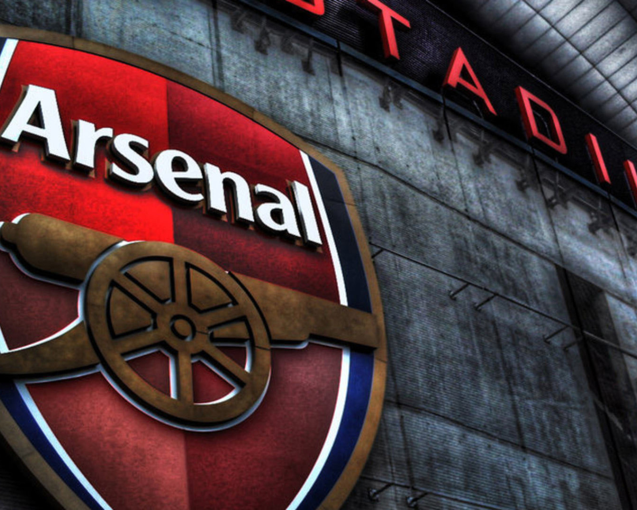Арсенал логотип на стене