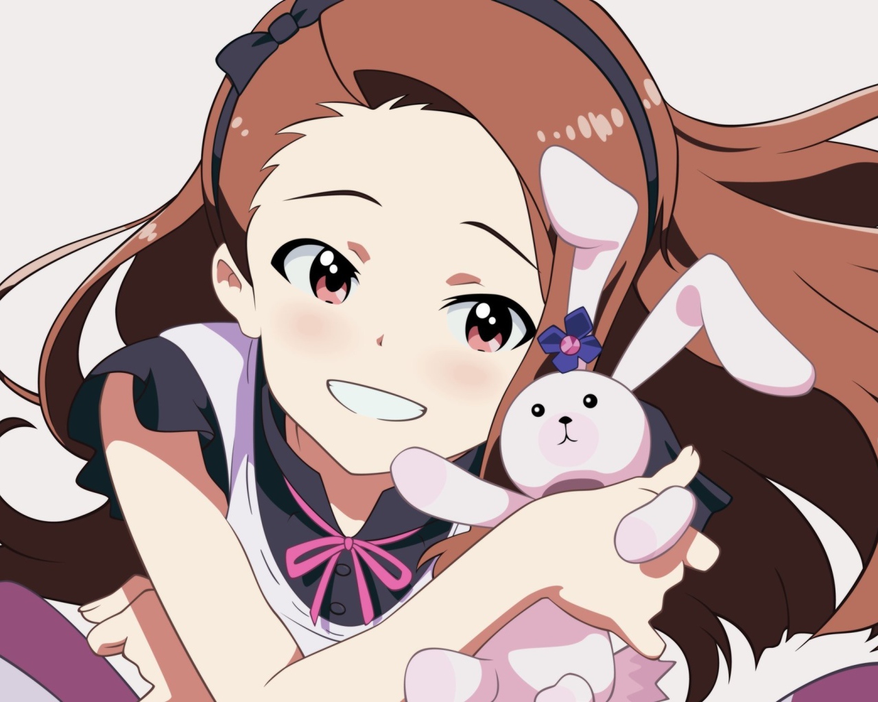 Девушка с игрушкой из аниме The Idolmaster