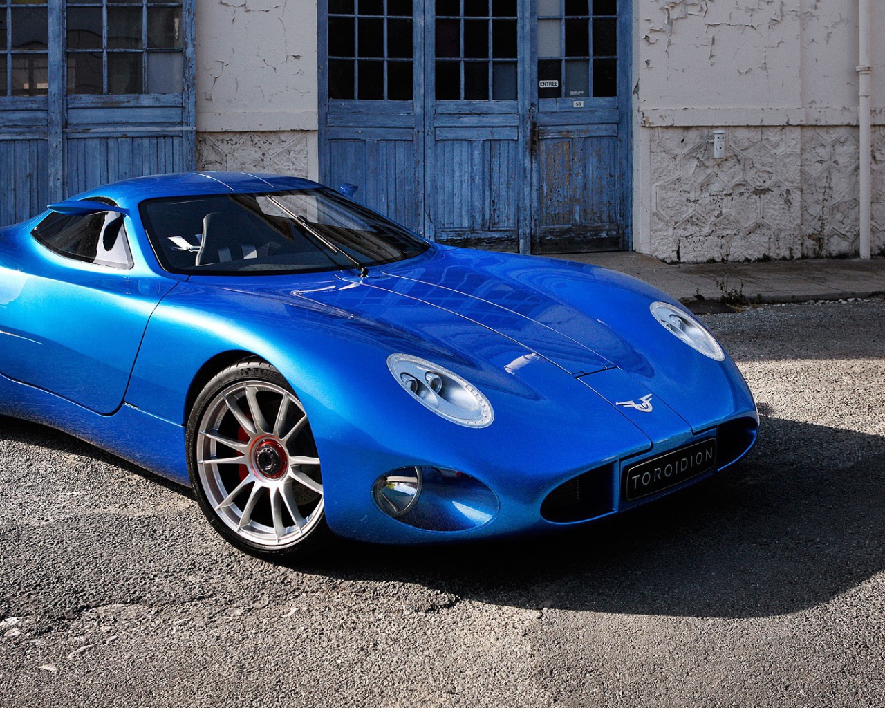 Синий автомобиль Toroidion 1MW
