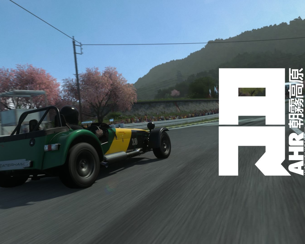 Автомобиль Caterham на гоночном треке