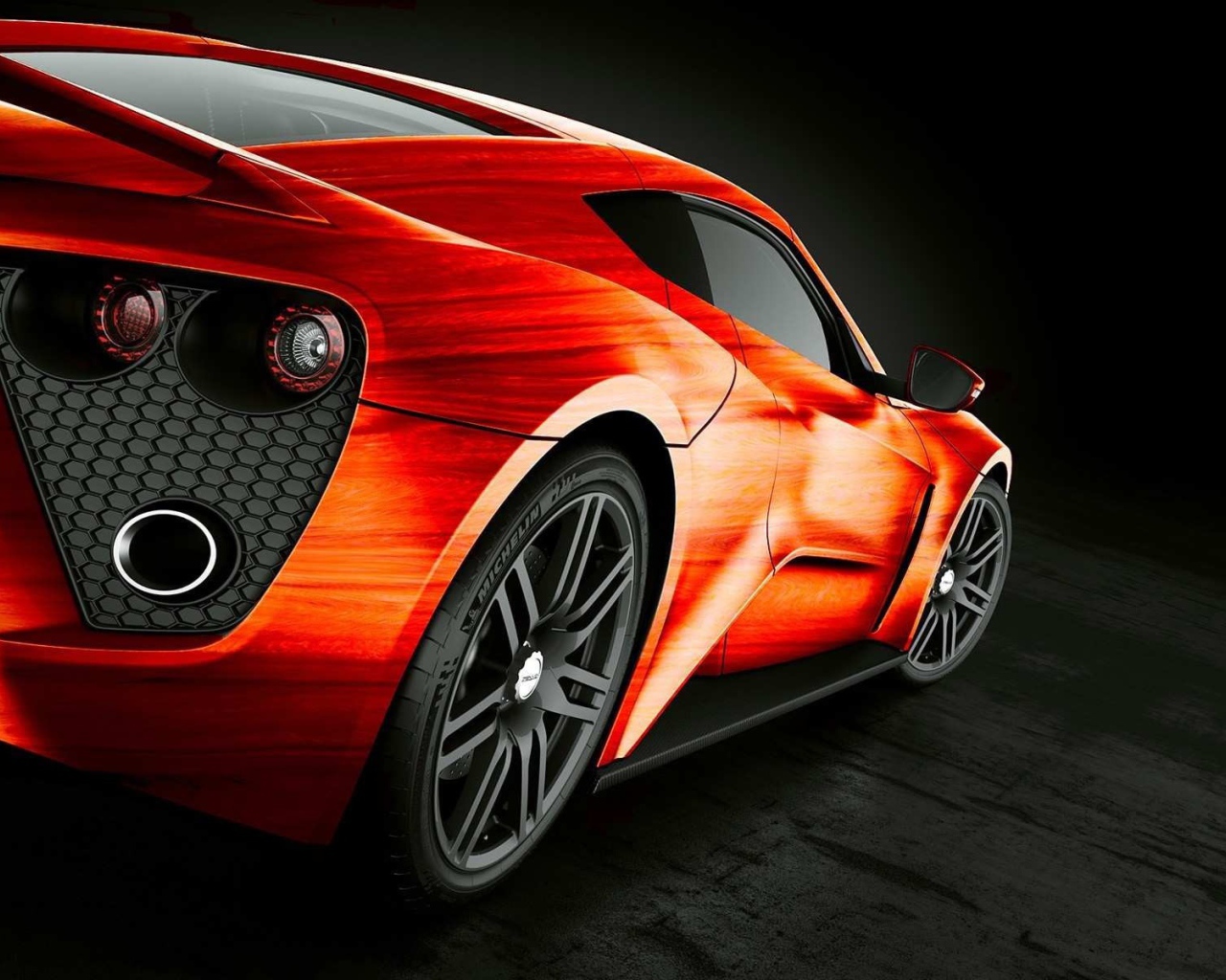 Оранжевый автомобиль Zenvo ST1