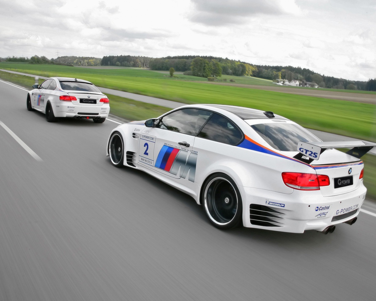 Racing cars on a white BMW M3 GTS