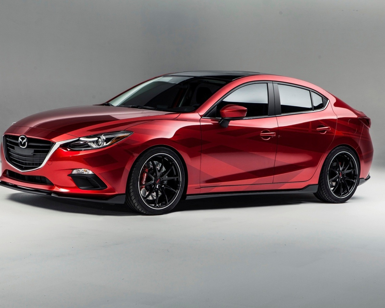 Красный автомобиль Mazda Vector 3