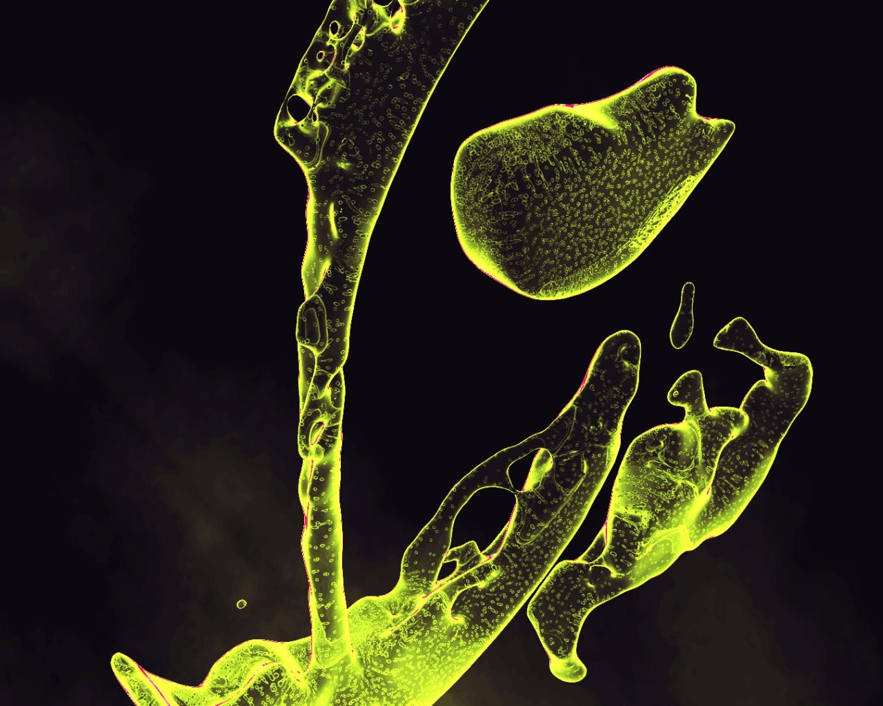 Капли зеленой жидкости на черном фоне