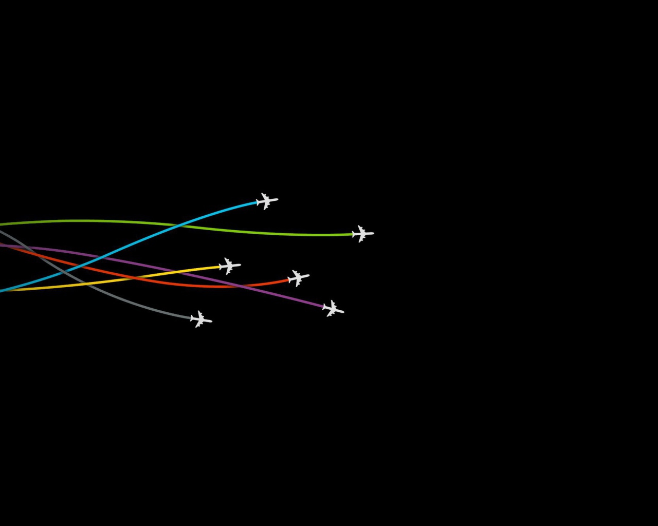 Самолеты оставляют следы на черном фоне