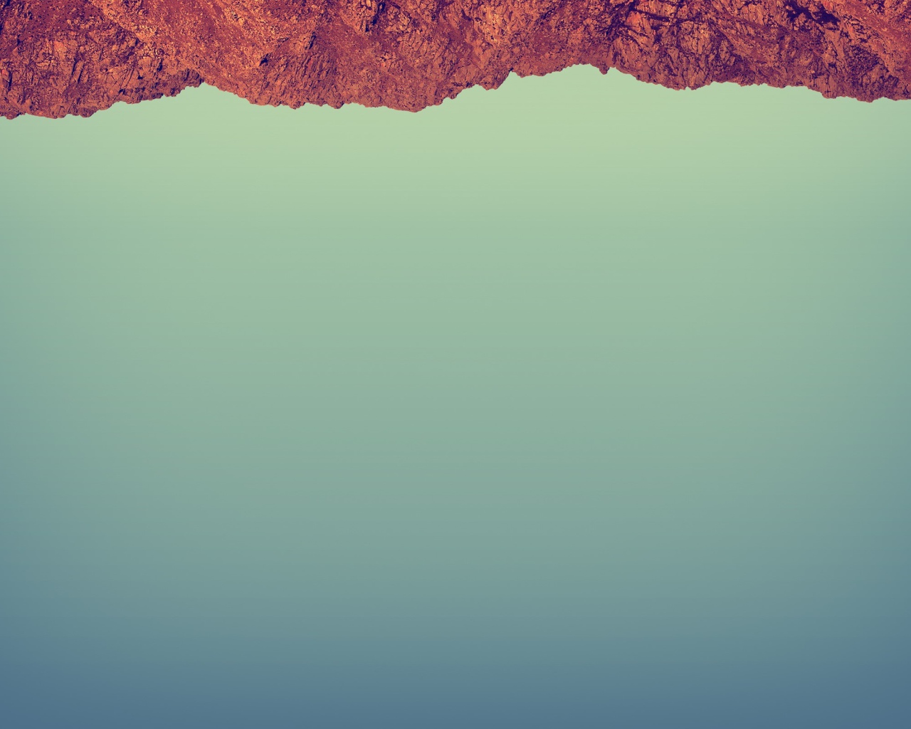 Красный камень на сером фоне