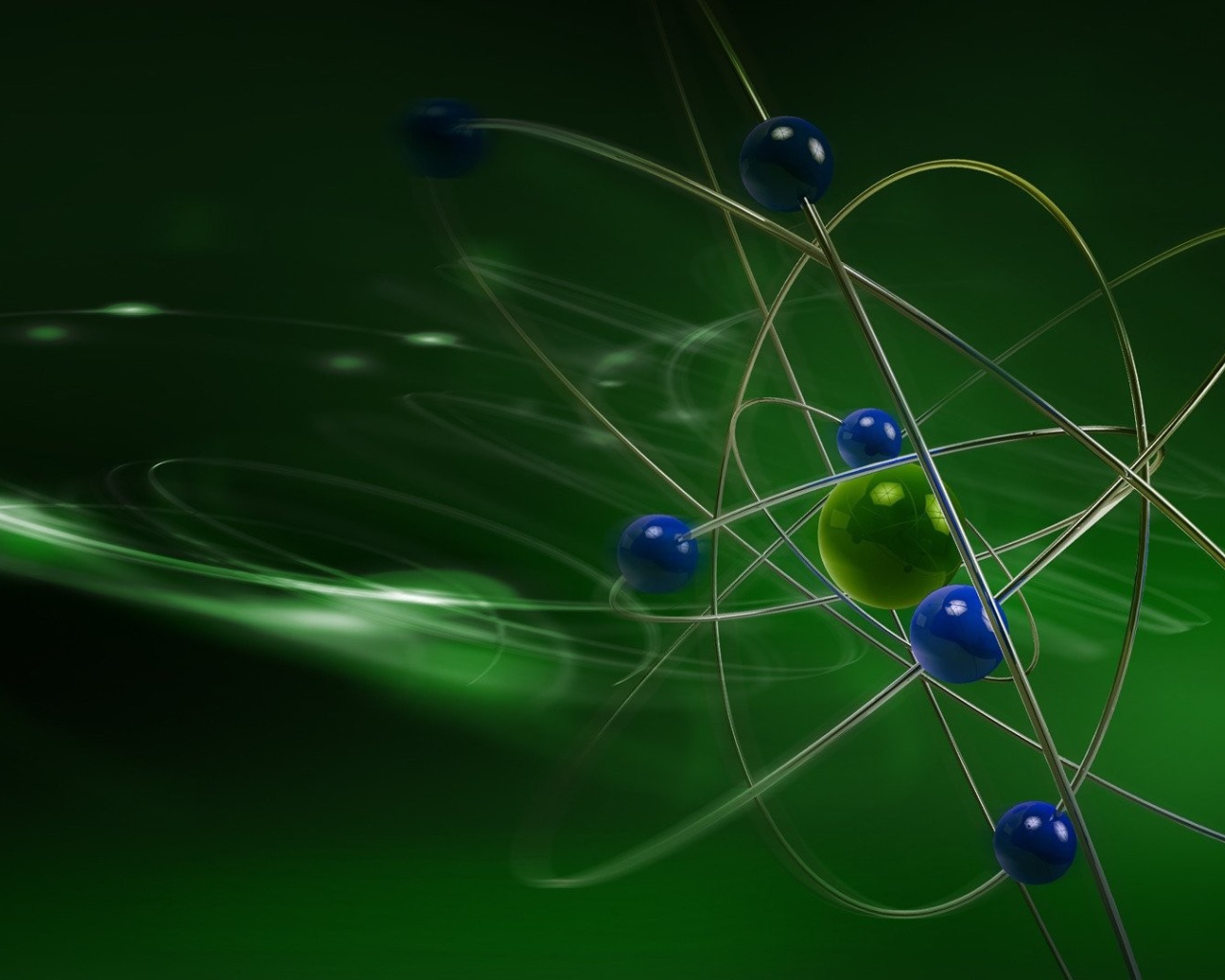 Модель атома на зеленом фоне