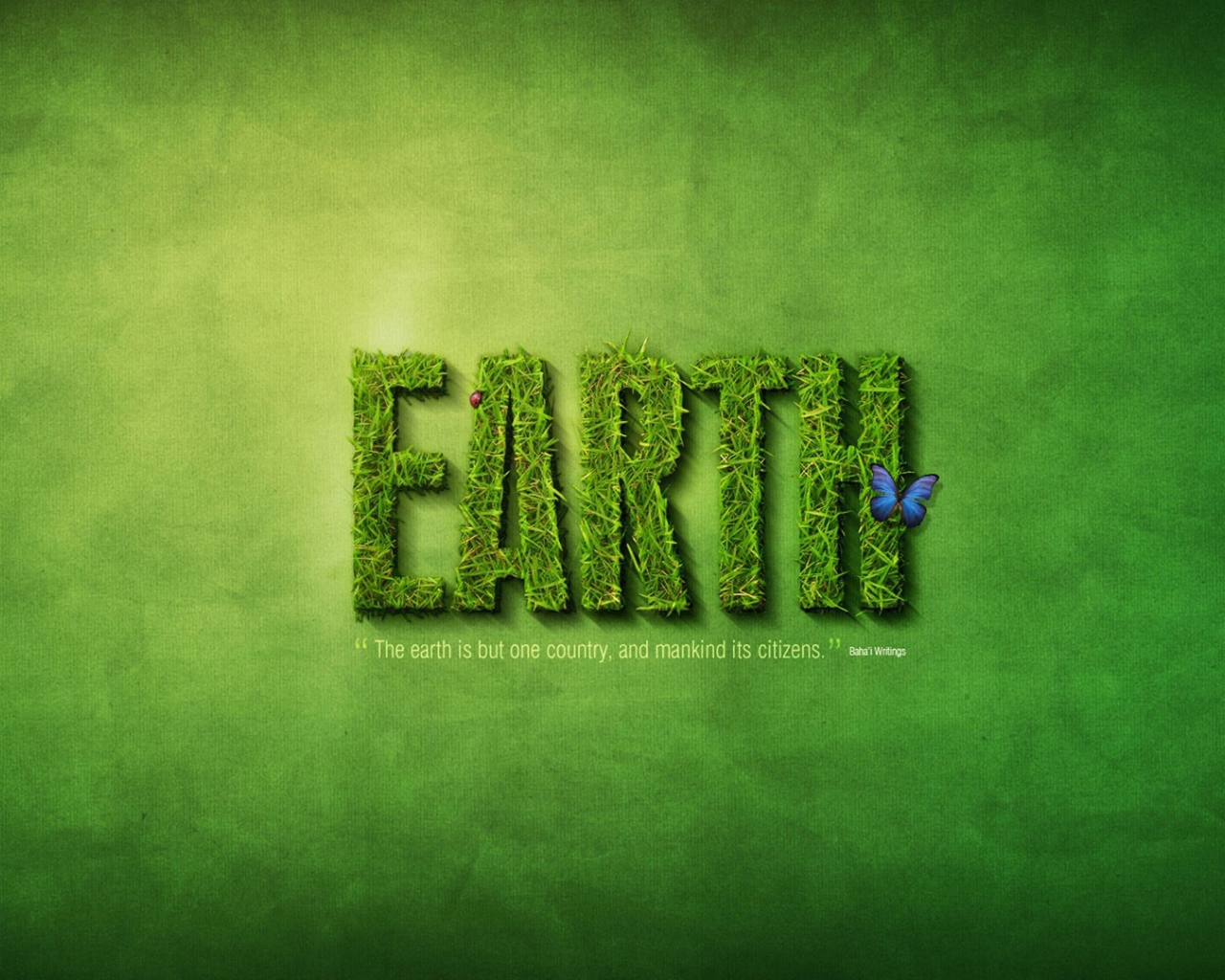 Надпись Земля из травы, зеленый фон