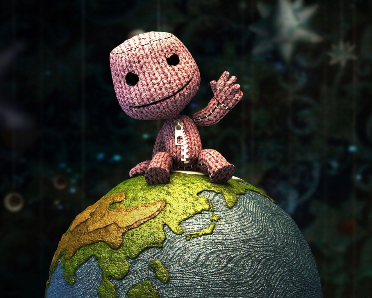 Вязаный человечек на глобусе