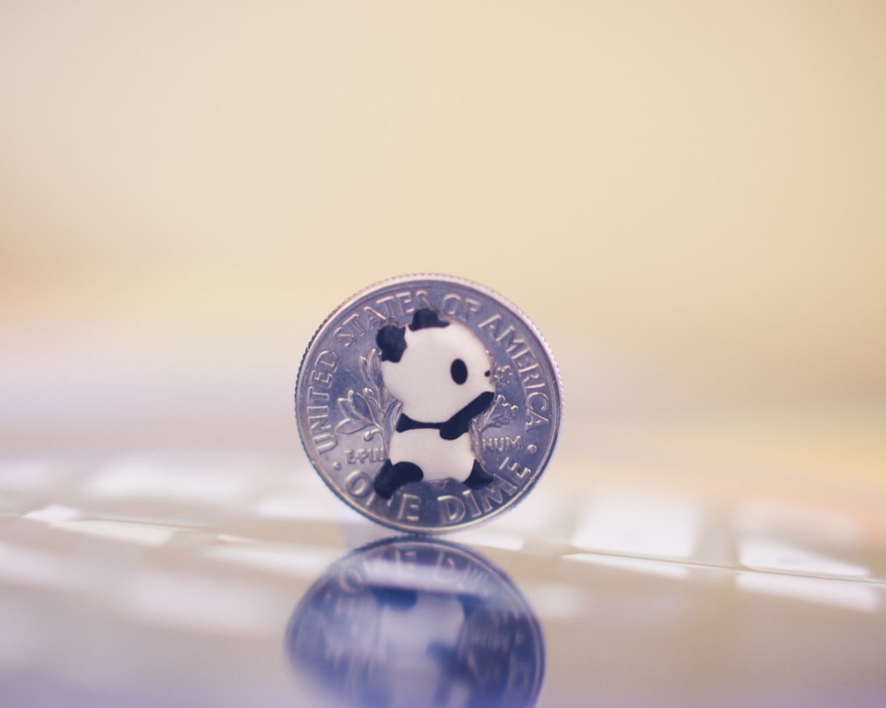 Панда на монете