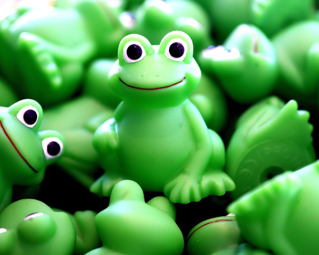 Игрушка лягушка