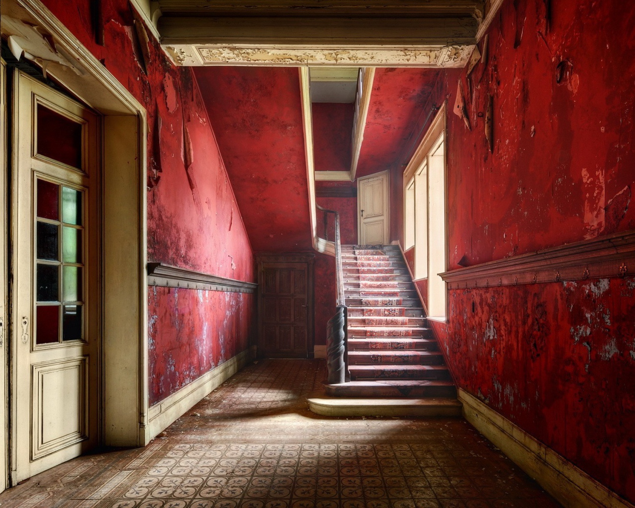 Red walls inside the abandoned house