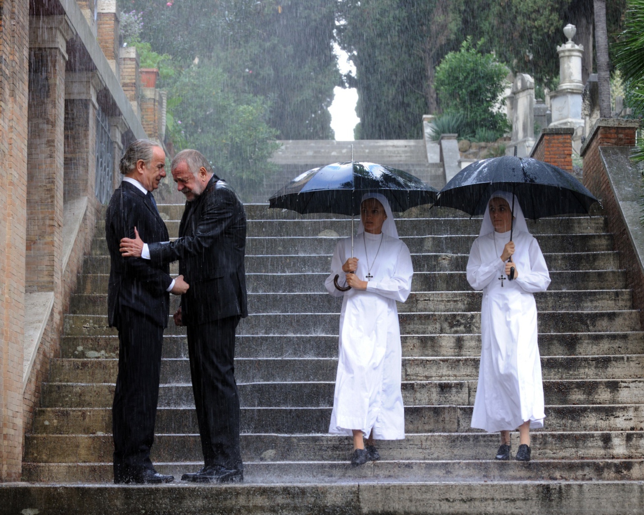 Монахи под дождем