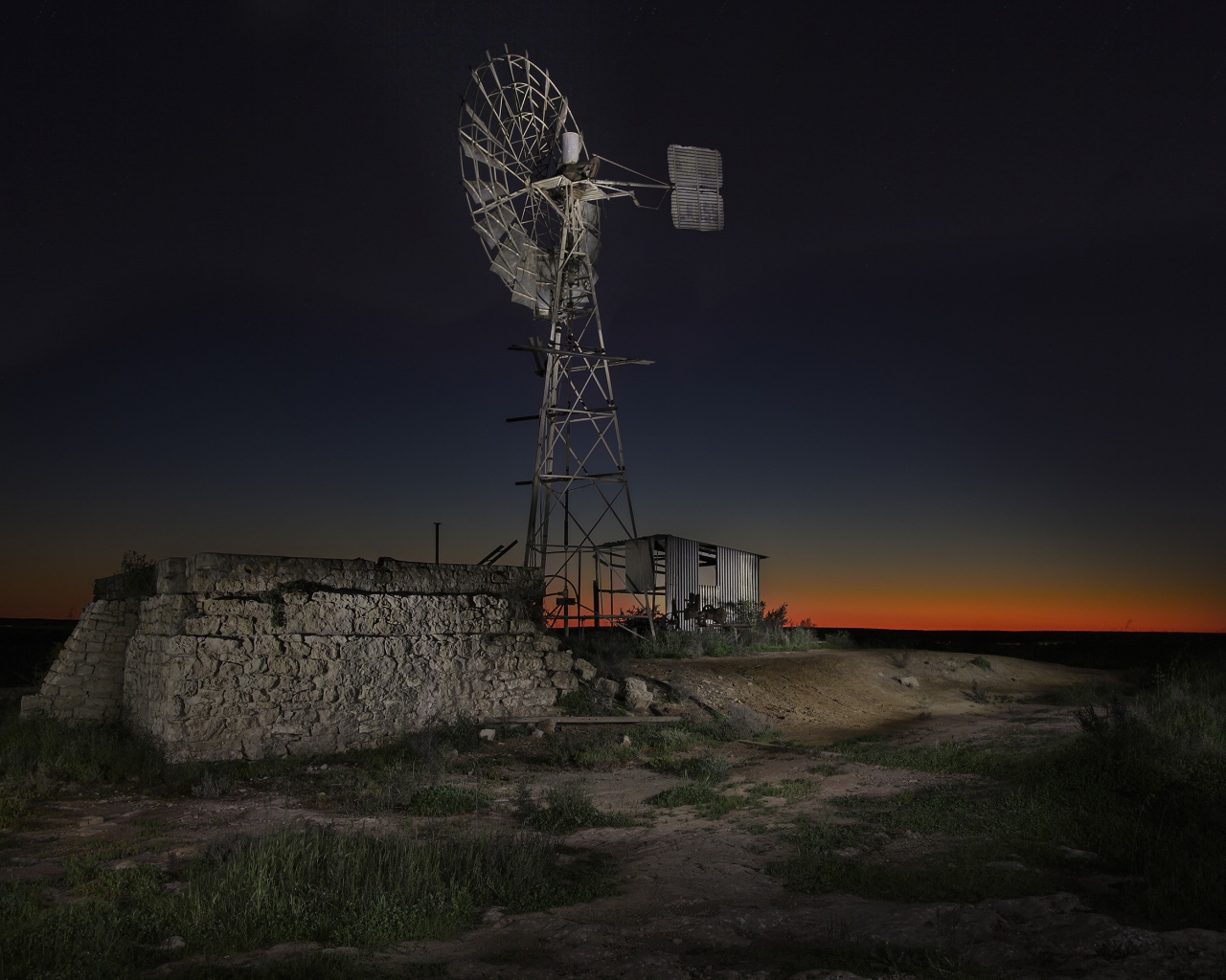 Wind turbine under the night sky in Australia