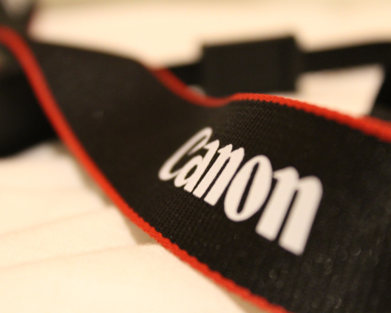 Ремешок от фотоаппарата Кэнон