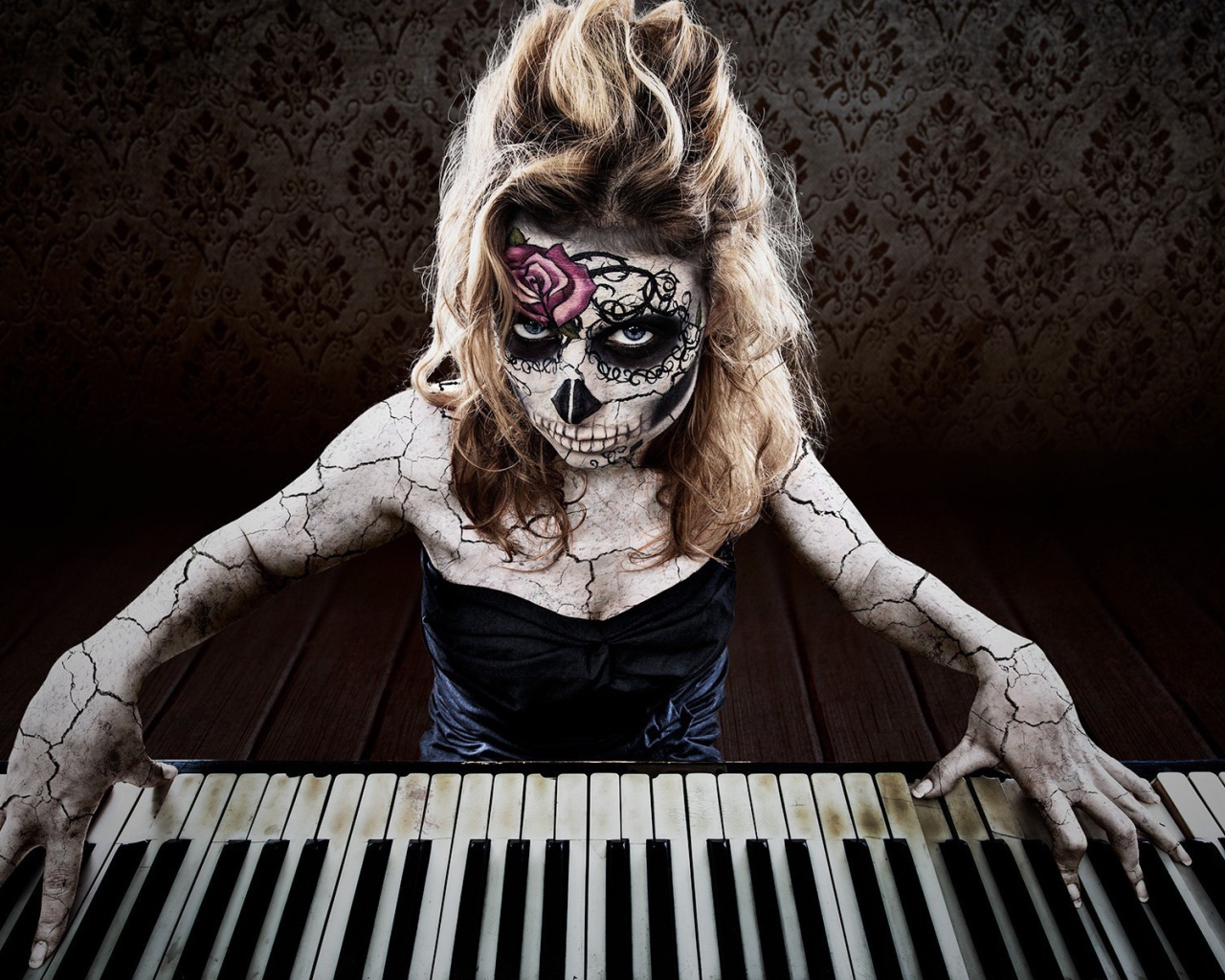 Tattooed girl playing the piano