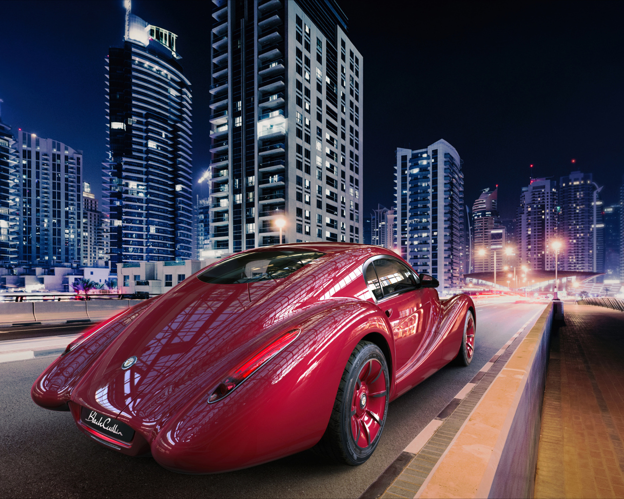 Необычный красный автомобиль Eadon Green Black Cuillin на фоне города 