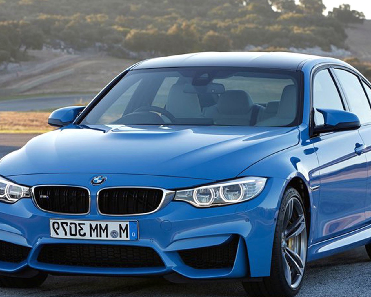 Синий BMW M3 Sedan 2017 года