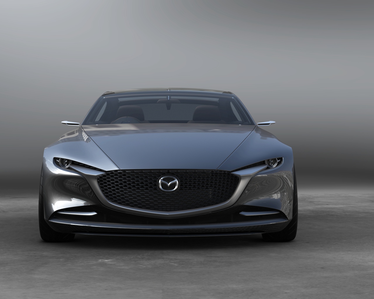 Серебристый автомобиль  Mazda Vision Coupe, 2017 вид спереди