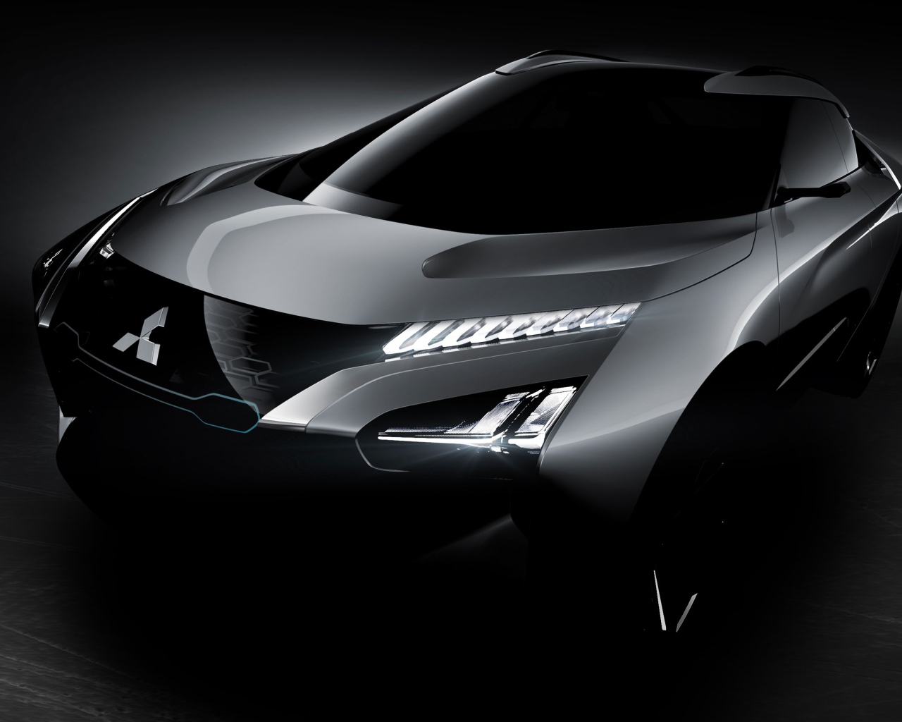 Серебристый автомобиль Mitsubishi Emirai 4 концепт