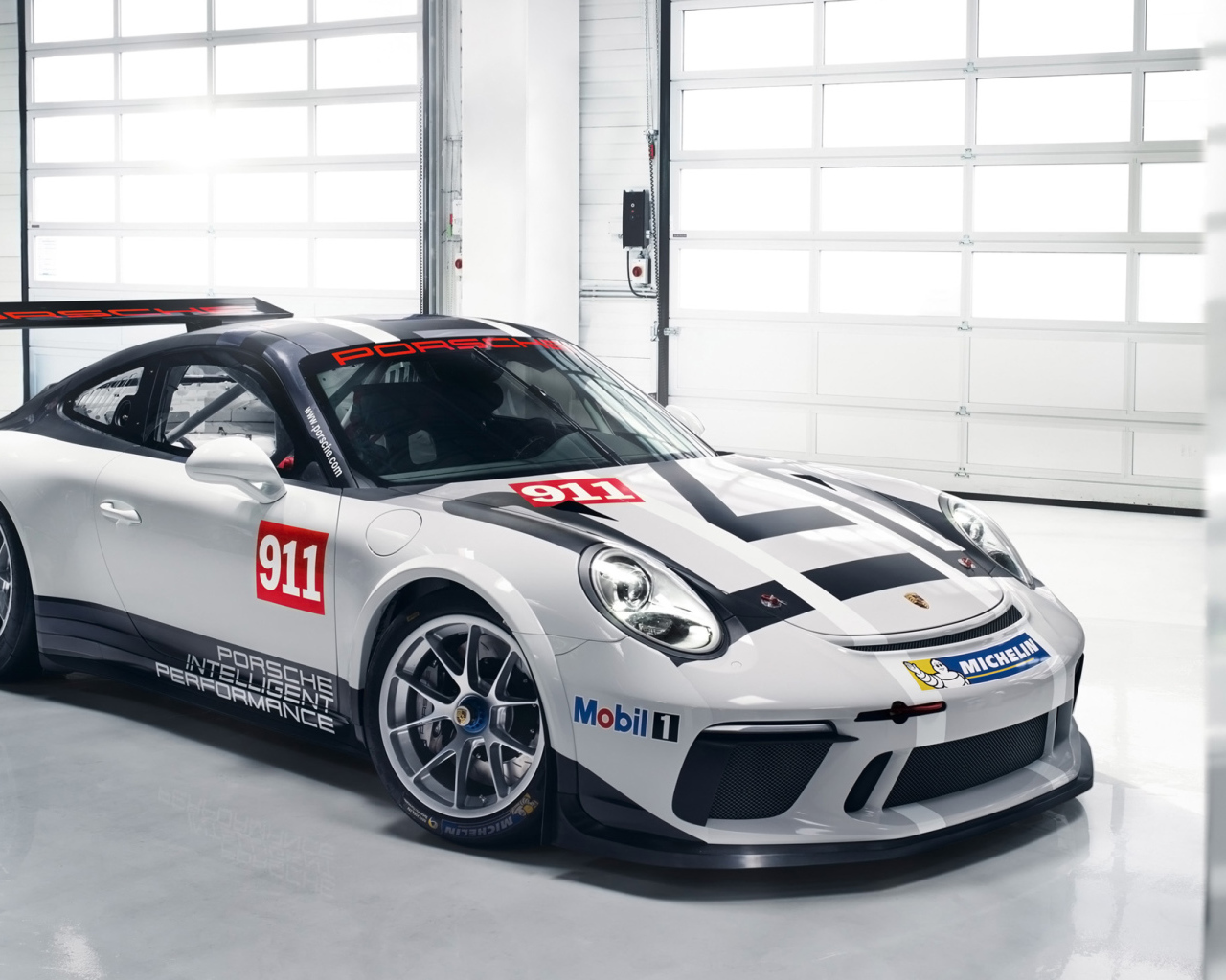 Sports car Porsche 911 GT3 in the garage