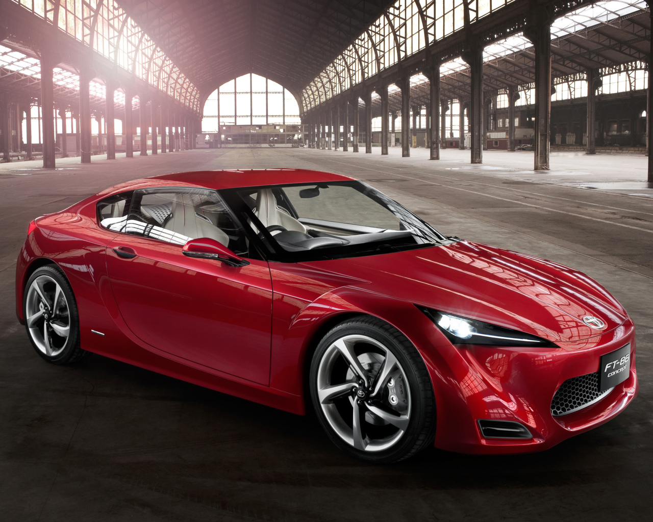 Красный спортивный автомобиль Toyota 86 