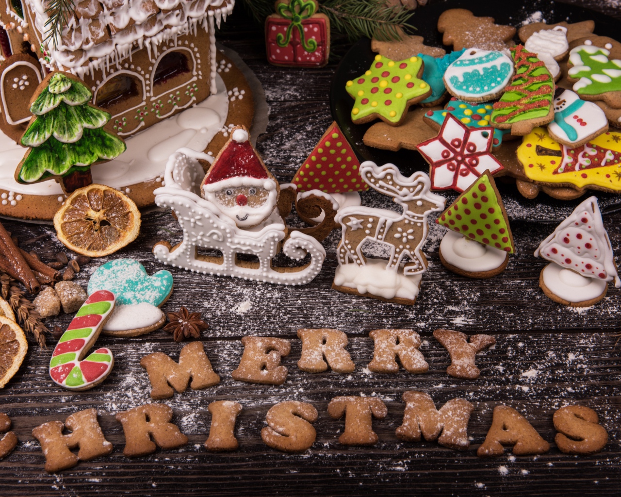 Treats for the holiday and cookies with the letters Merry Christmas