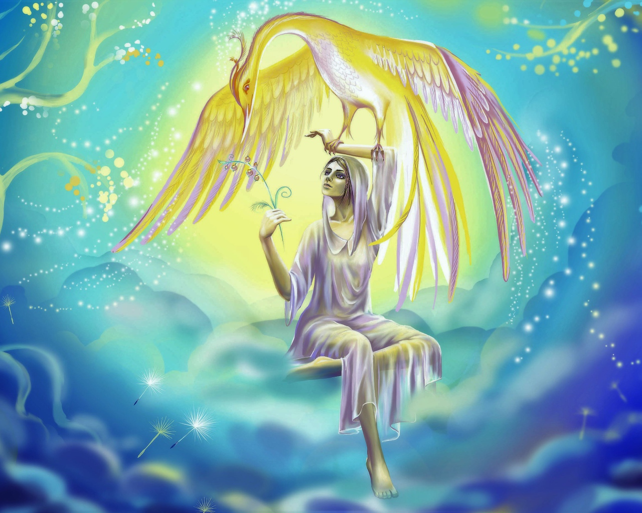 Красивая фантастическая девушка держит на руке птицу феникс