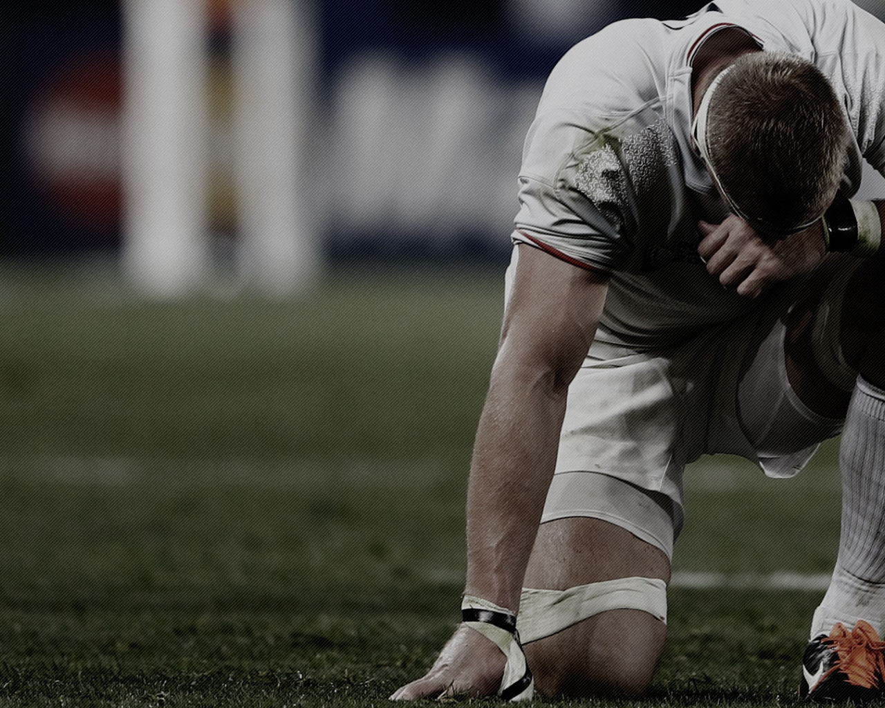 Спортсмен регбист на поле 