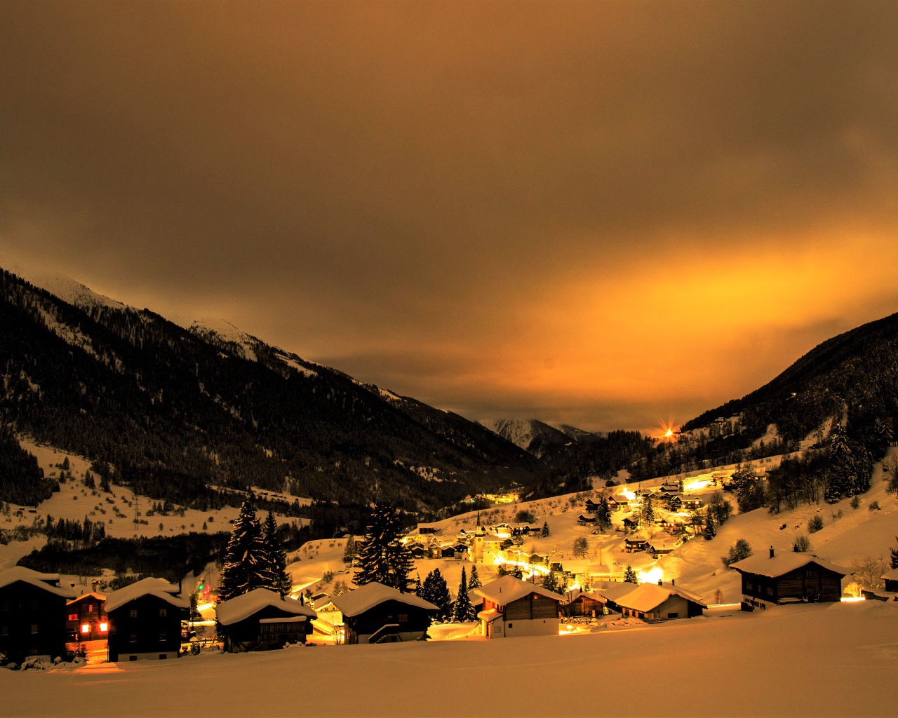 Winter night in a mountainous city, Switzerland