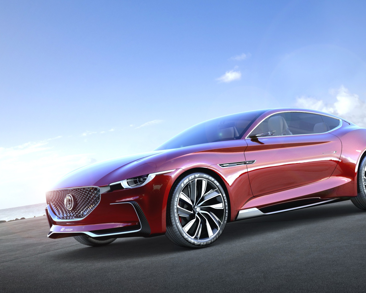 Электромобиль MG E-Motion, 2020 на фоне голубого неба