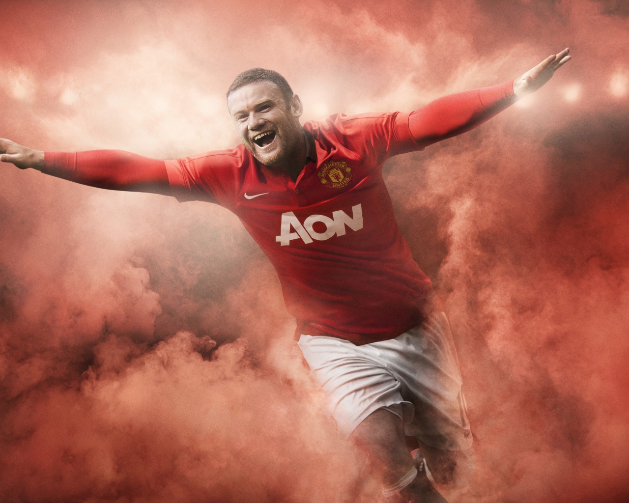 Футболист Уэйн Руни радуется победе 