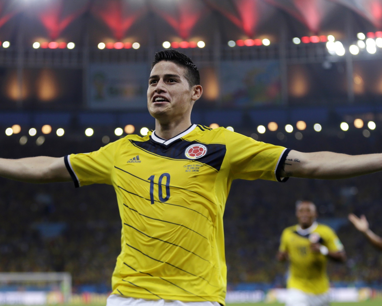 Футболист клуба Реал Мадрид Хамес Родригес радуется победе