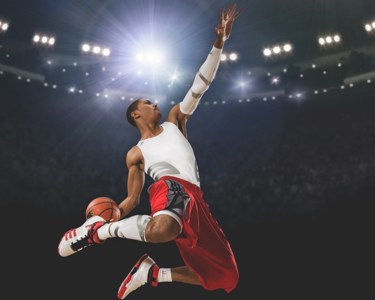 Прыжок с мячом баскетболиста Деррика Роуза 