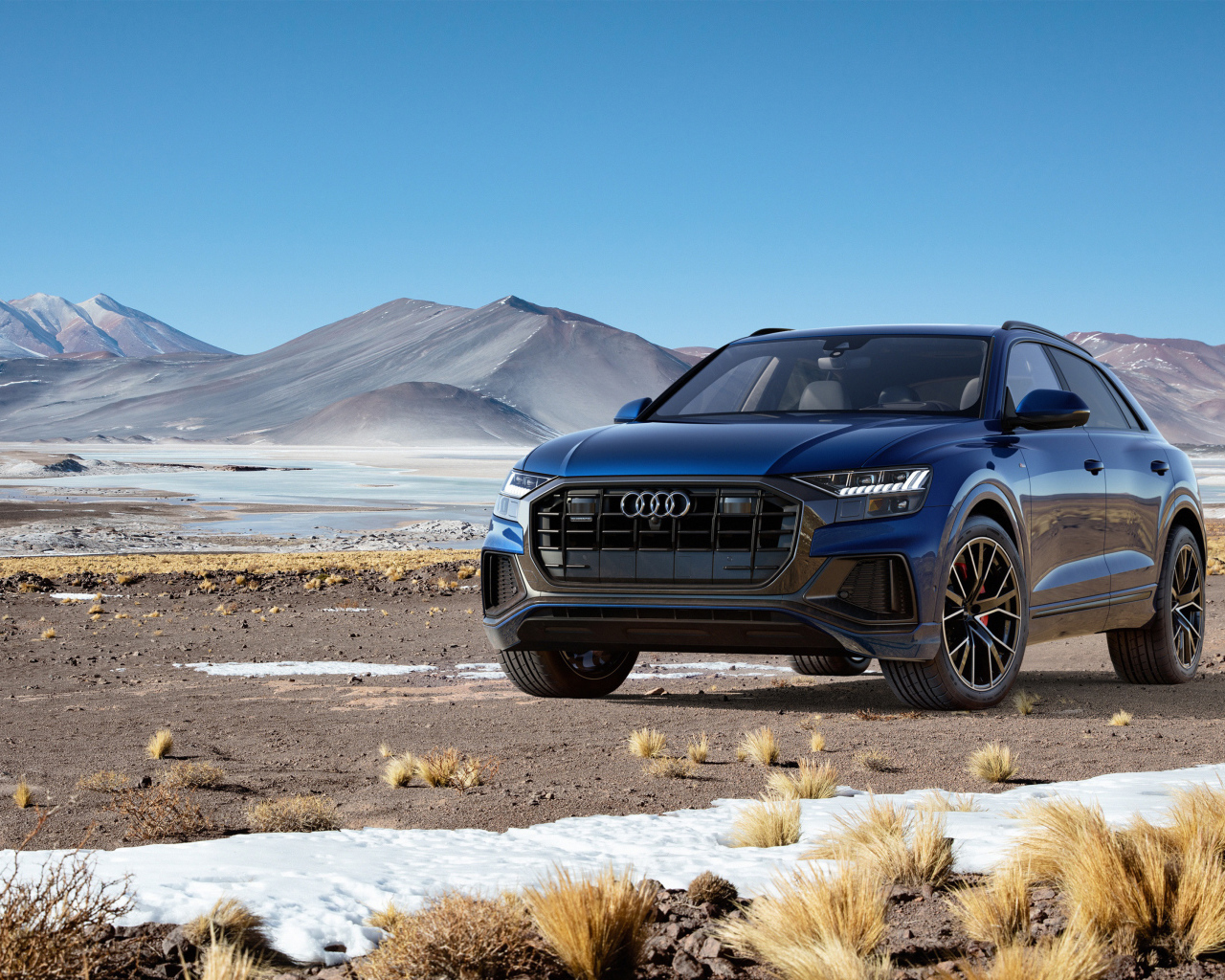 Black car Audi Q8 Quattro, 2018 on the background of the mountains
