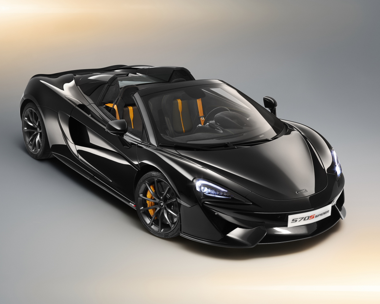 Черный автомобиль кабриолет McLaren 570S Spider, 2018