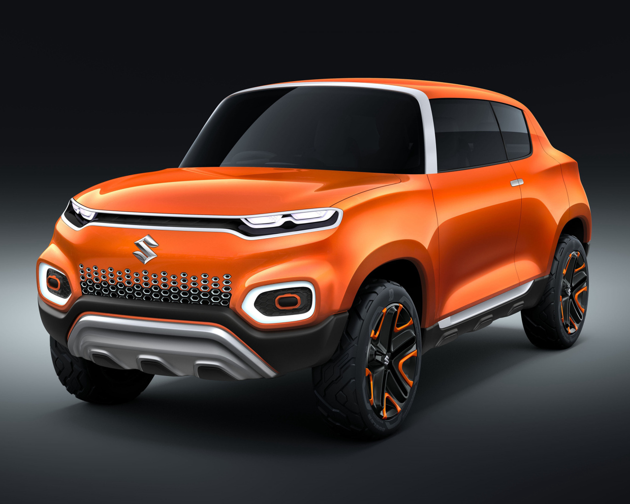 Оранжевый автомобиль Suzuki Concept Future S, 2018 на сером фоне