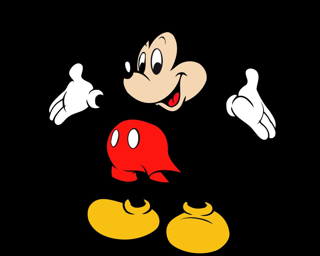 Популярный герой мультфильмов Микки Маус на черном фоне