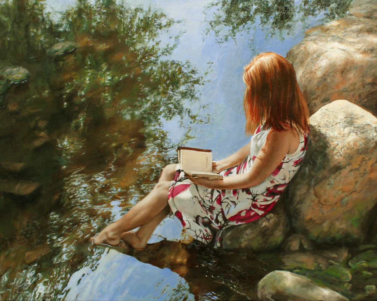 A painted girl with a book sits on a stone by the water