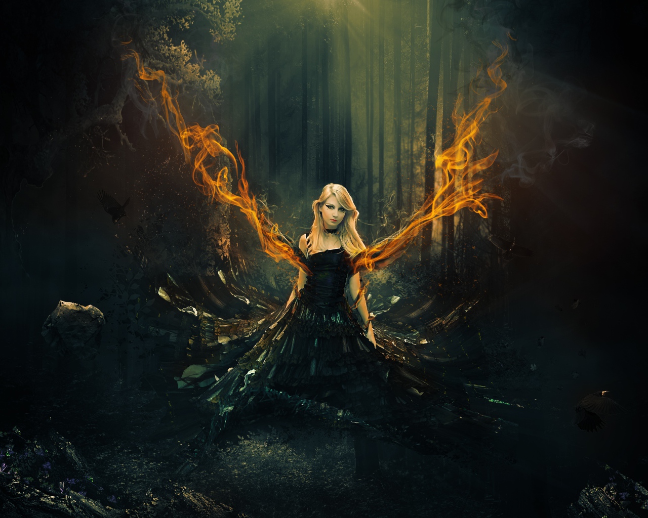 Фантастическая девушка в черном платье с огненными крыльями