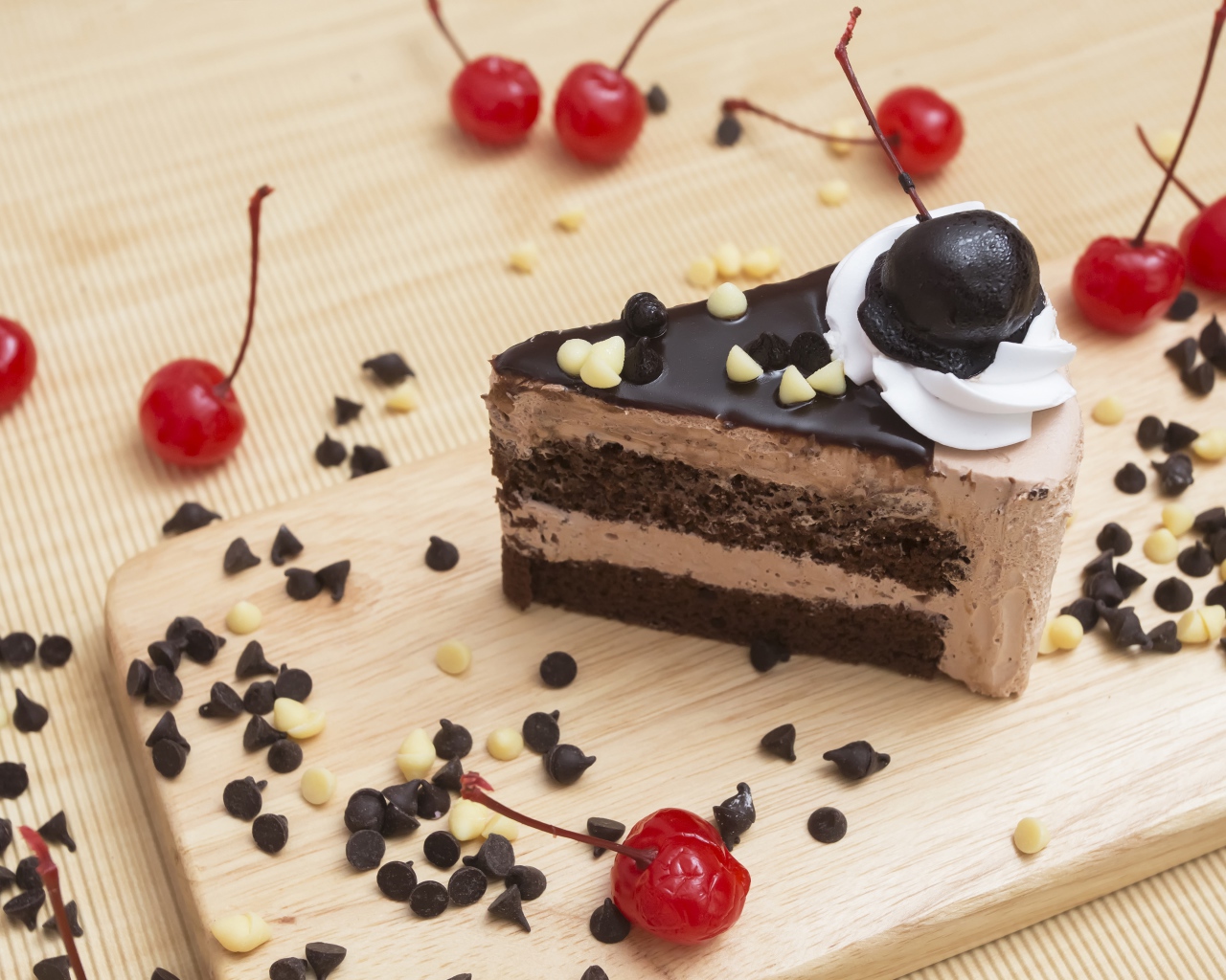 Appetizing piece of cake with chocolate and cherry berries