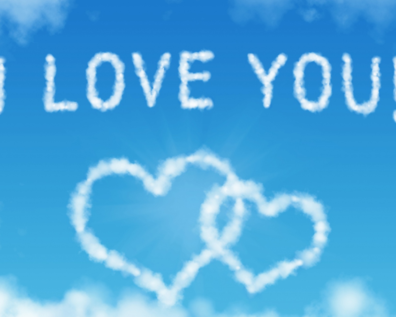 Надпись Я тебя люблю и сердечки из облаков