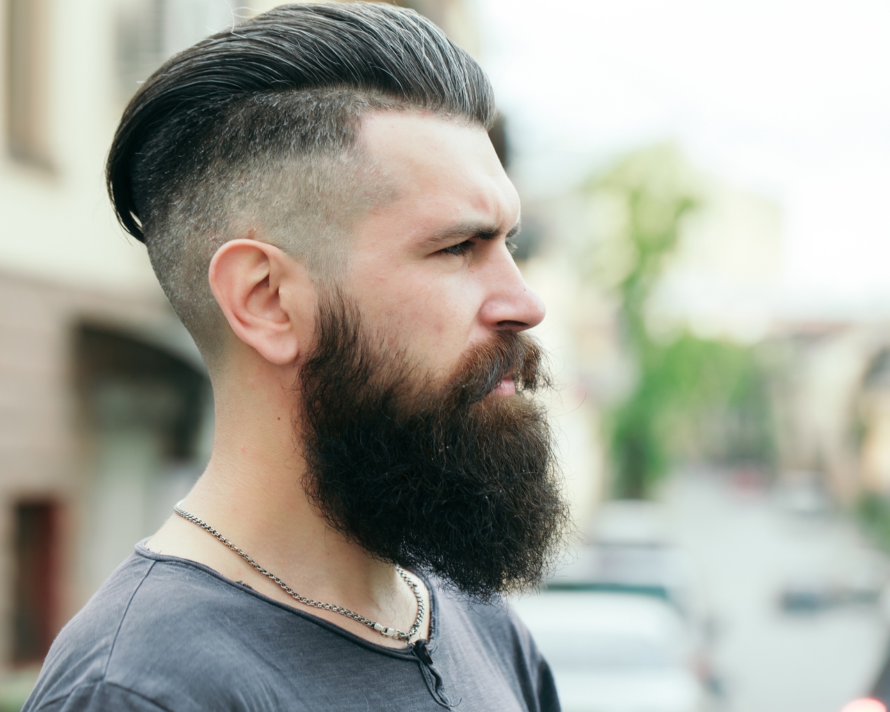 Stylish man with a beard and hair on his head