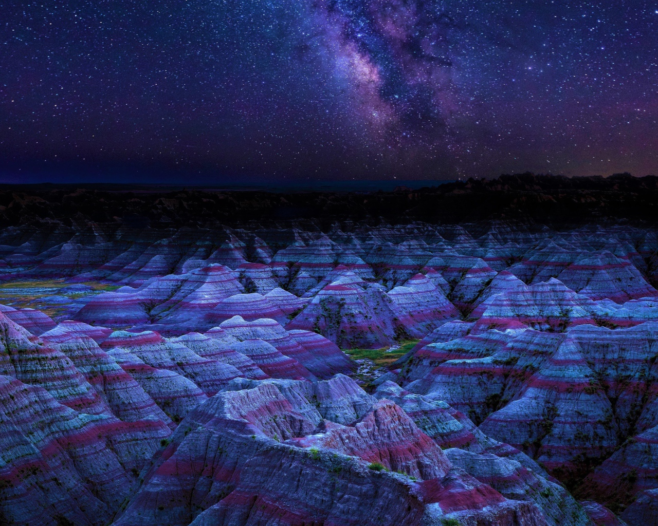 Milky Way over the rocks in the National Park of the Blacklands, USA