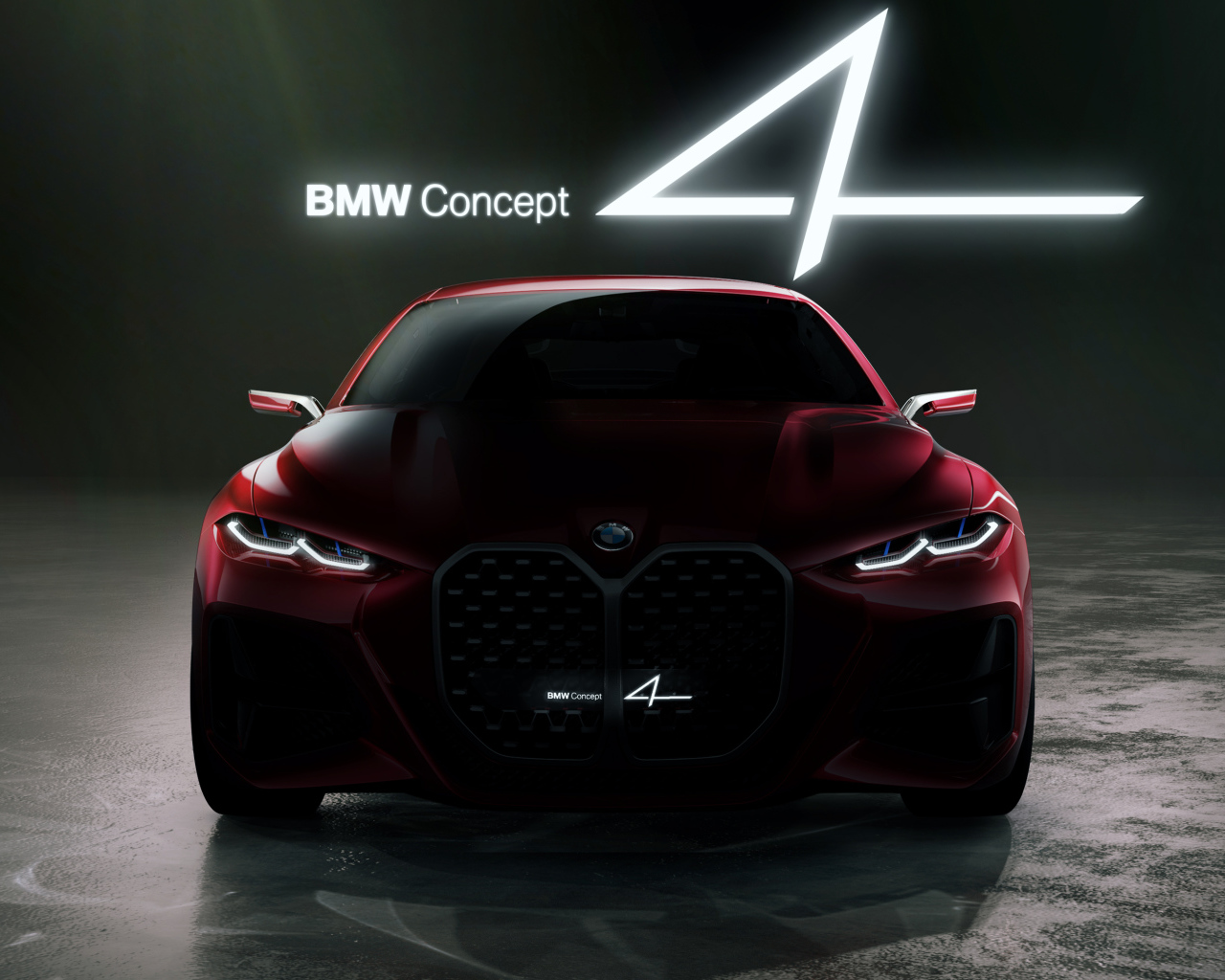 Красный автомобиль BMW Concept 4 2019 года на черном фоне